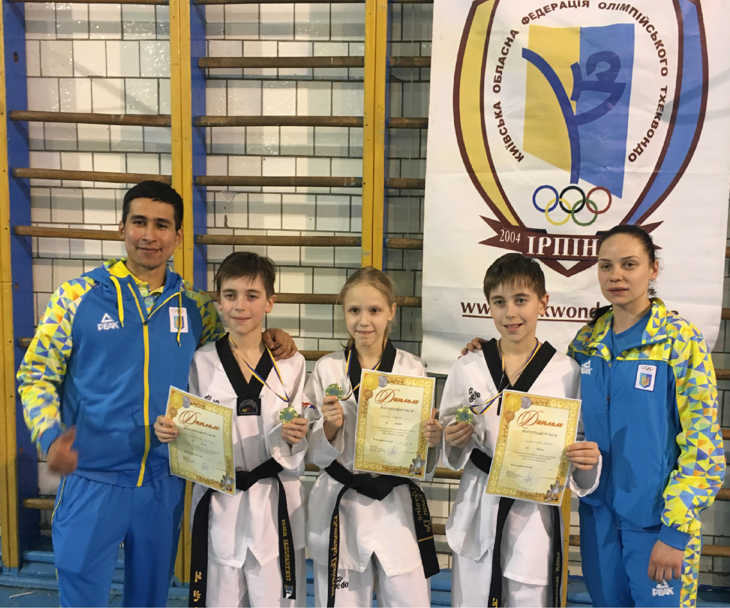 Young Champions with their trainers